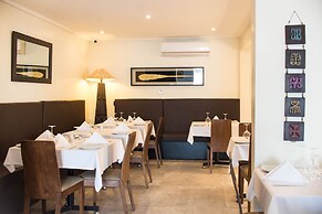 Earl Heights Suites Hotel