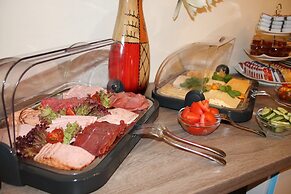 Le petit Palais – Hotel & Ferienapartments