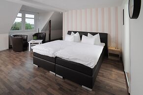 Le petit Palais – Hotel & Ferienapartments