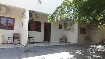 Pousada e Pizzaria Sol e Alegria