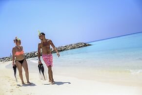 Triton Beach Hotel & Spa