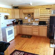 Wolf Den Log Cabin Motel and RV Park