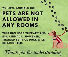 Wolf Den Log Cabin Motel and RV Park