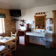Wolf Den Log Cabin Motel and RV Park