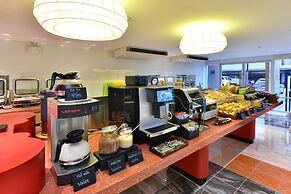 The Grass Serviced Suites by At Mind