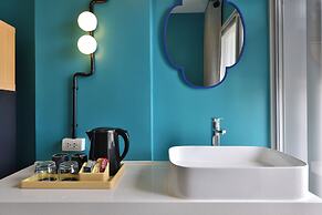 The Grass Serviced Suites by At Mind