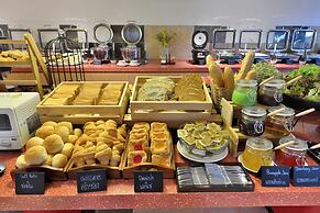 The Grass Serviced Suites by At Mind