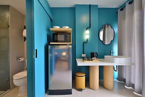 The Grass Serviced Suites by At Mind