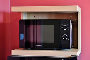 The Grass Serviced Suites by At Mind