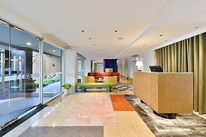 The Grass Serviced Suites by At Mind