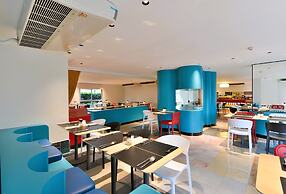 The Grass Serviced Suites by At Mind