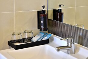 The Grass Serviced Suites by At Mind