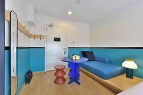 The Grass Serviced Suites by At Mind