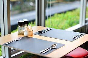 The Grass Serviced Suites by At Mind