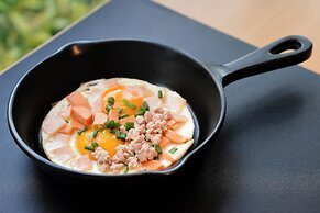 The Grass Serviced Suites by At Mind