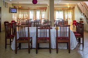 La Grand Chez Johnson Hotel Muyenga