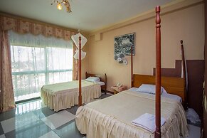 La Grand Chez Johnson Hotel Muyenga