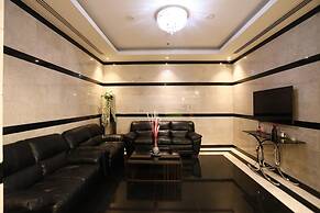 OYO 104 Q House 3 Apartments