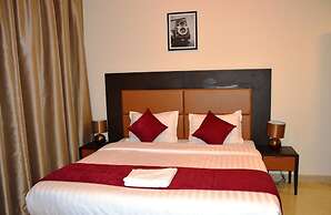 OYO 104 Q House 3 Apartments