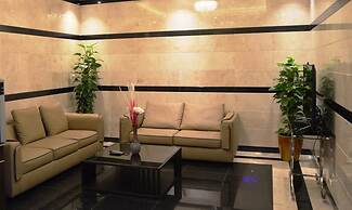 OYO 104 Q House 3 Apartments