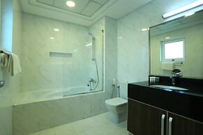 OYO 104 Q House 3 Apartments