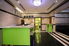 OYO 104 Q House 3 Apartments