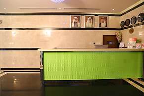 OYO 104 Q House 3 Apartments