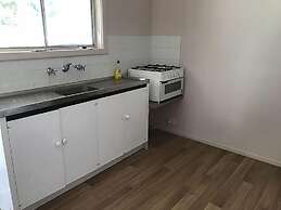 The Waterwheel Beach Cabins - Caravan Park