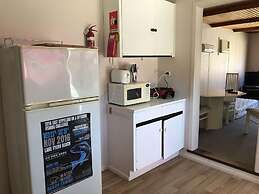 The Waterwheel Beach Cabins - Caravan Park