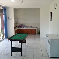 Vila Bunga Merah Gelatik