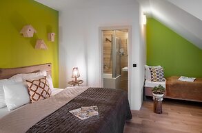 4 Trees Apartments by Adrez Living