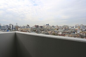 The Base Sakaihigashi Apartment Hotel