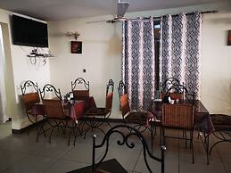 The Golden Apple Guest House