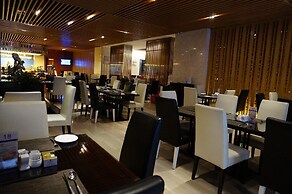 Manhattan Kinlen Hotel - Shishi