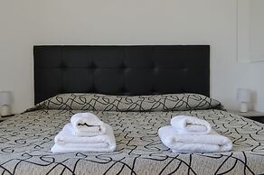 Leloir Suites & Meetings