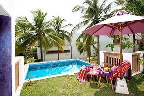 UTMT Underneath the Mango Tree Beach & Spa