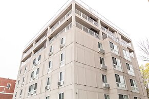 Harvard Square Apartments by Next Star
