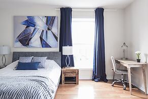 MTLVacationRentals - Suite Mont-Royal - 3 queen beds, 1,5 Ba