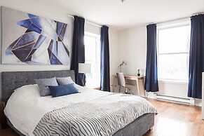 MTLVacationRentals - Suite Mont-Royal - 3 queen beds, 1,5 Ba
