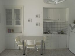 Blue and White Studios & Apartments