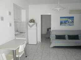 Blue and White Studios & Apartments