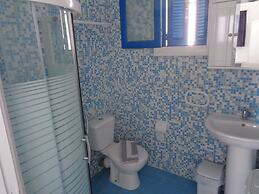 Blue and White Studios & Apartments