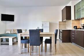 Helios Studios & Apts