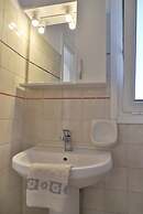 Helios Studios & Apts