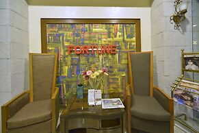 Paragon Hotel and Suites