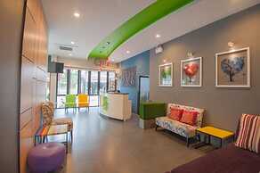 The Cozy Nest Boutique Rooms