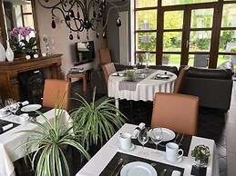 Au Coeur Des Hôtes