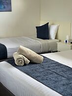 The Highlander Motel - 24HR Check In