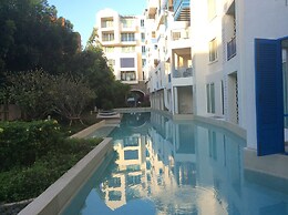 The Che Pool Access Beachfront Condo by Away