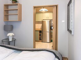 VacationClub - Willa Carmen Apartments